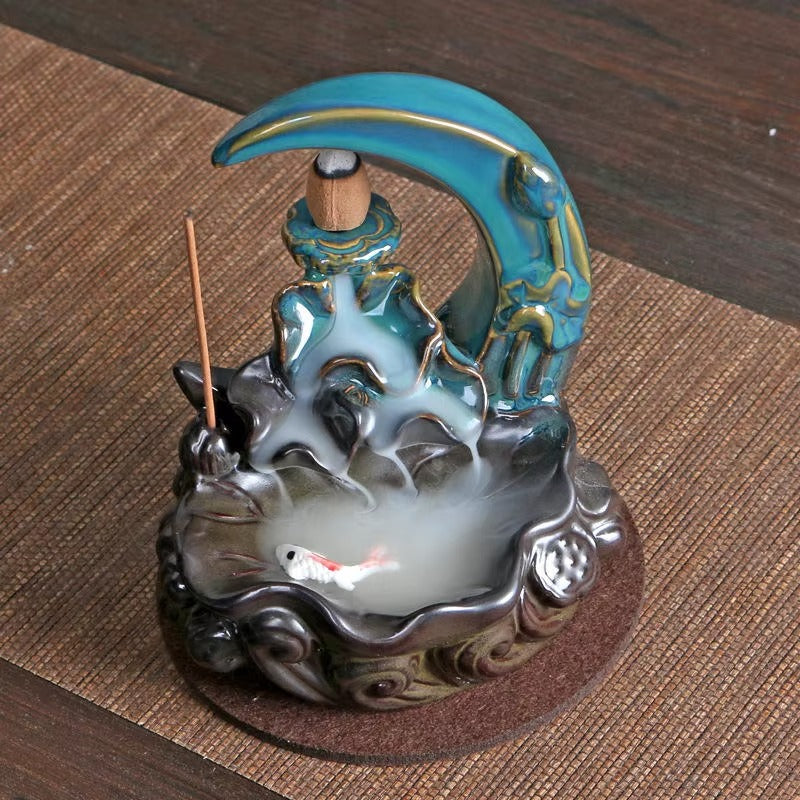Garmoly Moon Weihrauchbrenner mit 60 Weihrauchkegeln + 30 Weihrauchstab Keramik Wasserfall Weihrauch Brenner Backflow Weihrauchhalter fĂŒr Aromatherapie Ornament Home Decor (Cyan)